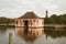 Historic boathouse and Currituck Beach Lighthouse near Corolla,