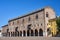 historic brick building with portico and windows, Palazzo del Capitano in the city of Mantua