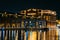 The historic Broadway Pier at night, in Fells Point, Baltimore, Maryland