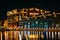 The historic Broadway Pier at night, in Fells Point, Baltimore, Maryland