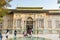 Historic building of green palace Shahvand House of Iranian visitor walking in Sa`dabad palace Complex, built by the Qajar and