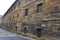 Historic building wall from Calle del Aquila street in Downtown of Oviedo City in Spain