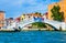 Historic buildings and bridge waterfront promenade Venice