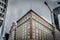 Historic buildings in downtown Los Angeles under a grey sky