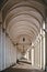 Historic buildings, Marble corridor in sunlight, Arcades of Mount Berico in Vicenza, Italy