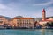 Historic buildings on promenade in Trogir, Croatia. Trogir is popular travel destination in Croatia. Trogir, as a UNESCO World