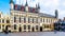 Historic buildings of the Town Hall, and the Basilica of the Holy Blood to the right, on the Burg Square in Bruges, Belgium