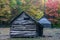 Historic cabins in the Great Smoky Mountains during fall.