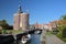 The historic center with sailing boats, the Drommedaris Gate Tower dated from 1540 on the left and the tower of Zuiderkerk