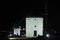 Historic Charm: Spanish Windmills in Consuegra Aglow with Nighttime Splendor