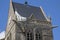 Historic church of Sainte mere l`eglise, with a paratrooper hanging on the bell tower.