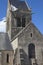 Historic church of Sainte mere l`eglise, with a paratrooper hanging on the bell tower.
