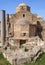 the historic church of yia Kyriaki Chrysopolitissa in paphos cyprus showing the rear of the building and old roman columns and