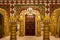 Historic City Palace Jaipur royal room with gold artwork at Rajasthan, India