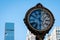 Historic clock on the Fifth Avenue, at the intersection with Broadway, New York, USA