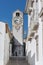 Historic clock tower view - Church of Santa Maria do Castelo- in the city Tavira, Algarve, Portugal