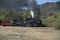 Historic Cumbres Toltec narrow-gauge train steam engine enroute to Antonito, Colorado train station
