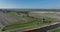 Historic dutch windmills in a farm and grass field landscape in The Netherlands Holland. Famous touristic attraction for