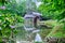 Historic Edwin B. Mabry Grist Mill (Mabry Mill) in rural Virginia on Blue Ridge Parkway and reflection on pond in summer