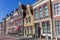 Historic facades of houses at the Noorderhaven harbor of Harlingen