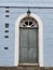 historic flood marks on the pale blue wall of an old house in Traben Trarbach, a Moselle river town