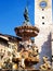 Historic fountain in the cathedral square of Trento