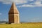 historic grave in the middle of empty fields