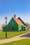Historic green wooden house in the Zaanse Schans village