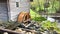 Historic grist mill with a working water wheel, spring summer time, no people.