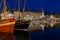 Historic harbor Honfleur with sailing ships in the evening, France