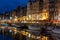 Historic harbor Honfleur with sailing ships in the evening, France