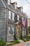 Historic home displaying early American Flag