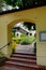 Historic house with Adobe roof, palm trees elaborate landscaping