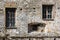 Historic house built in ancient bricks with windows and loopholes. Italian castle