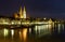 Historic houses, palaces, and churches on the bank of the Danube in the light of sunset