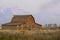 The historic John Moulton barn with the mountains in the background at Grand Teton National Park in Wyoming.