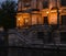 Historic lanterns at the back of the Berlin Dome at dusk with reflections in a window