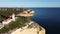 Historic lighthouse by the coast of Algarve, Carvoeiro, Portugal