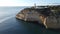 Historic lighthouse by the coast of Algarve in Carvoeiro, Portugal