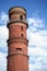 Historic lighthouse of red bricks in Luebeck Travemuende Baltic