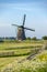 The historic Lisserpoel windmill along the river the Ringvaart