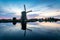 The historic Lisserpoel windmill in the evening. On the Ringvaart river in Lisse.