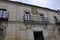 Historic Mansion Architecture with blazon from Medieval Santillana del Mar Town in Spain.