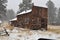 Historic miners assay cabin in Guffey, Co during a snow storm