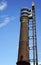 Historic and modern renovated chimney as landmark