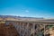 Historic Navajo steel bridges over Colorado River spans marble Grand Canyon and red rocky mountain landscape in northern Arizona
