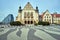 historic, neo-Romanesque buildings of the University and modern office building