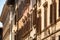 Historic old apartment buildings with timber shutters over the windows