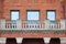 Historic Old Red Sandstone Building Windows Brick and Balcony