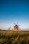 The historic old windmills inTÃ©s at Lake Balaton in Hungary, Beautiful sunset in the field